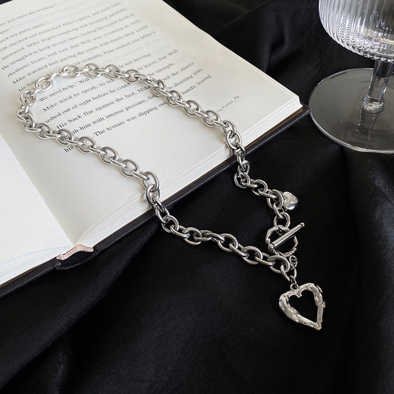 Vòng cổ Bằng Thép Titan Mặt Trái Tim Rỗng Màu Bạc Thời Trang Cho Nữ