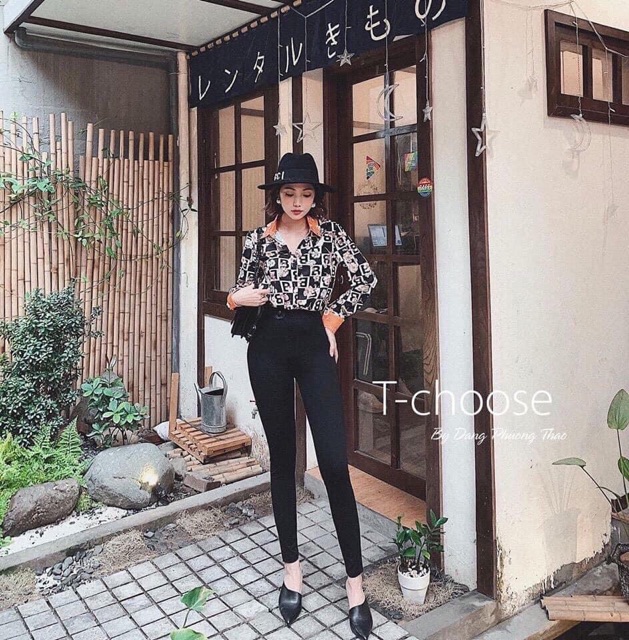 Quần leging nắp túi da
