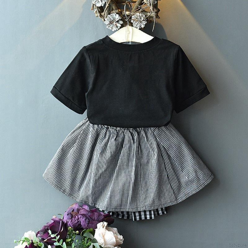 Bộ áo thun ngắn tay + chân váy nơ cho bé gái