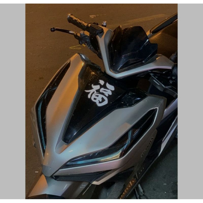 Tem chữ tàu dán xe máy