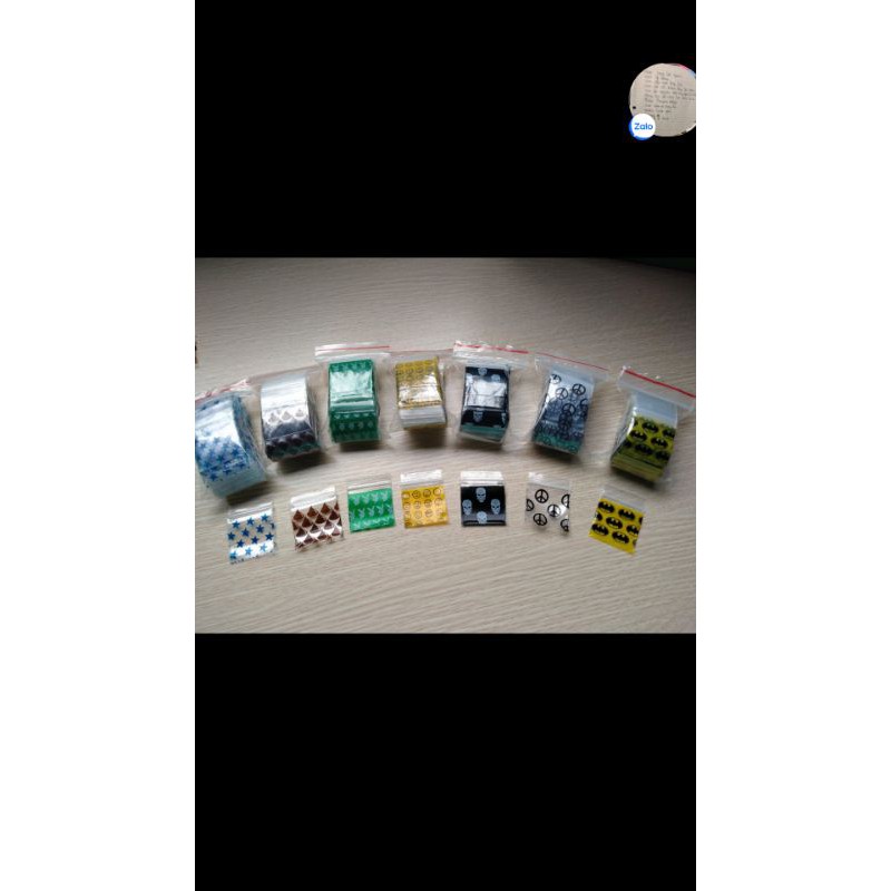 100 cái túi zip kt 3x4cm hình họa tiết loại mỏng, mềm, mượt