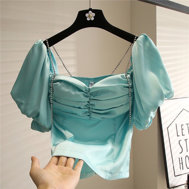One-word collar chiffon lining careful machine leaking shoulder 100 pleated waist halter halter top 2022 Korean version thin bubble sleeve blouse
