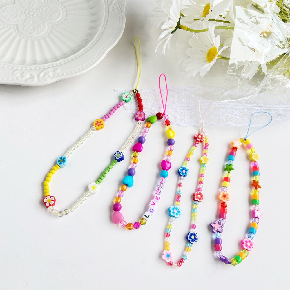 Dây đeo điện thoại dạng chuỗi hạt acrylic hình mặt cười nhiều màu sắc chống thất lạc thời trang cho nữ