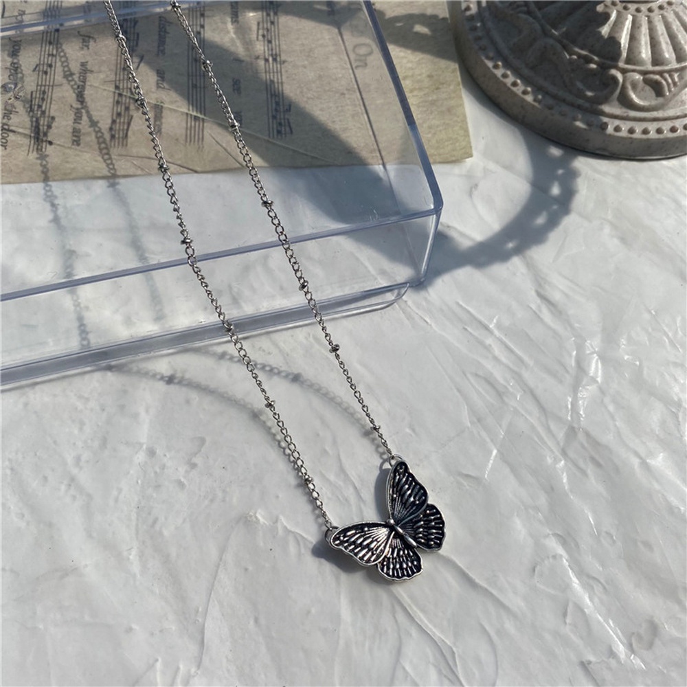 Dây chuyền mặt hình bướm đính ngọc trai thời trang dành cho nữ