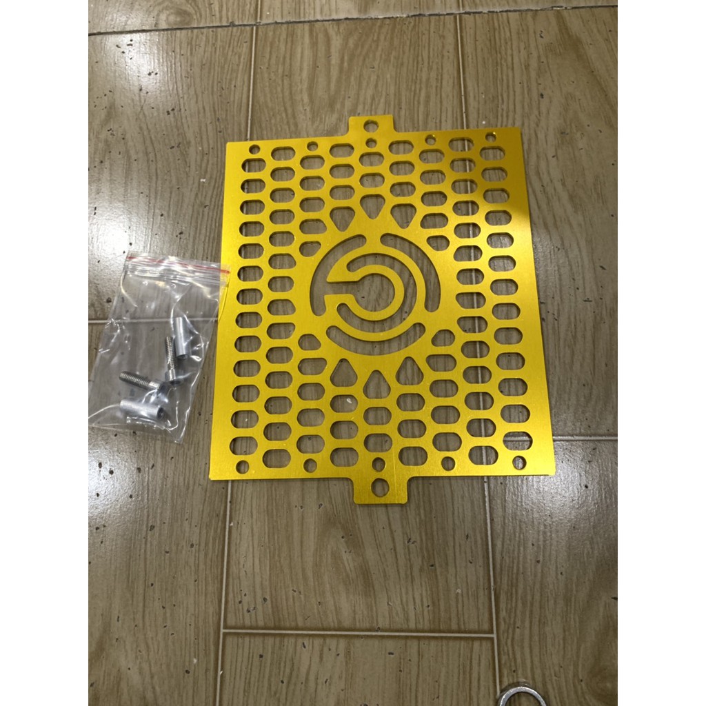 che két nước xe satria và raider fi nhôm cnc màu vàng