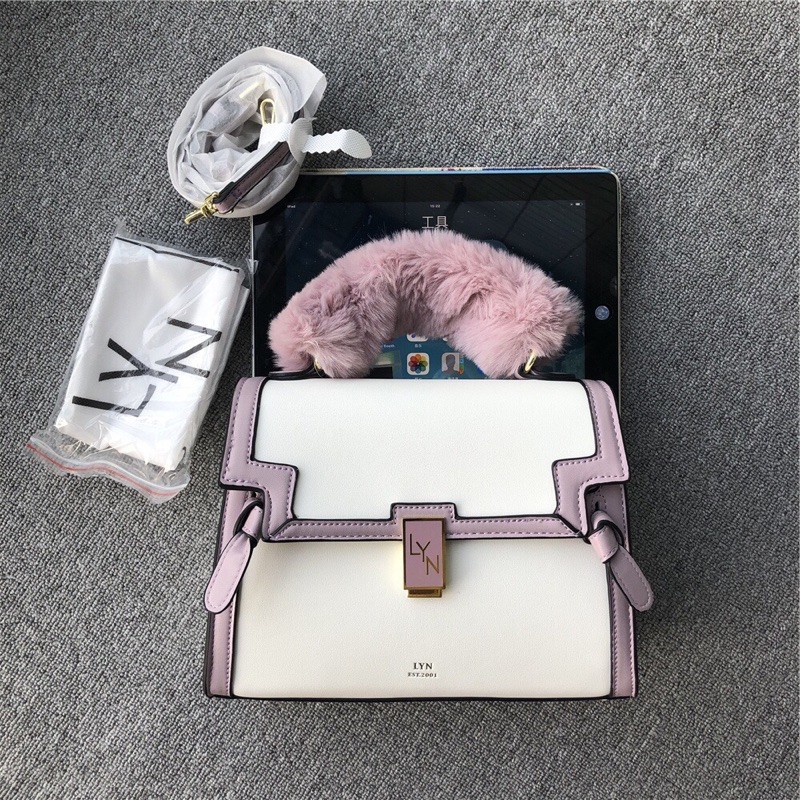 Túi lyn tay cầm lông