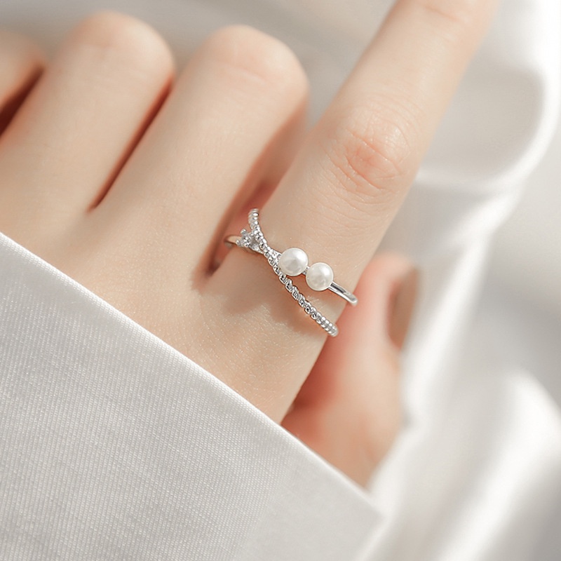 Nhẫn bạc nữ kiểu xoắn đính hạt trai nhân tạo, Nhẫn hở free size - Trang sức bạc Evasilver