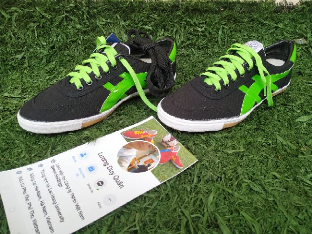 Giày bata warrior đen sọc xanh lá