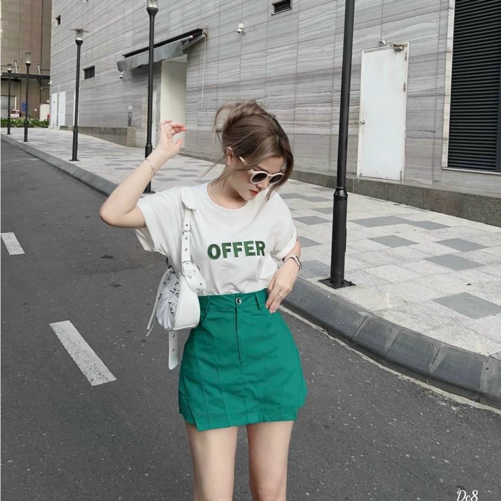 Set 2 món áo và váy đi chơi phong cách năng động với chân váy chữ A có túi kèm áo thun cổ tròn form rộng có chữ