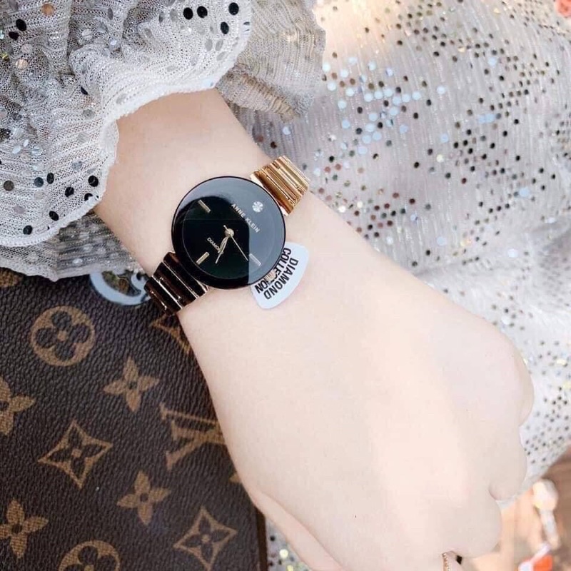 Đồng hồ nữ ANNE KLEIN model AK/2434BKGB tone vàng gold mặt đen sang trọng
