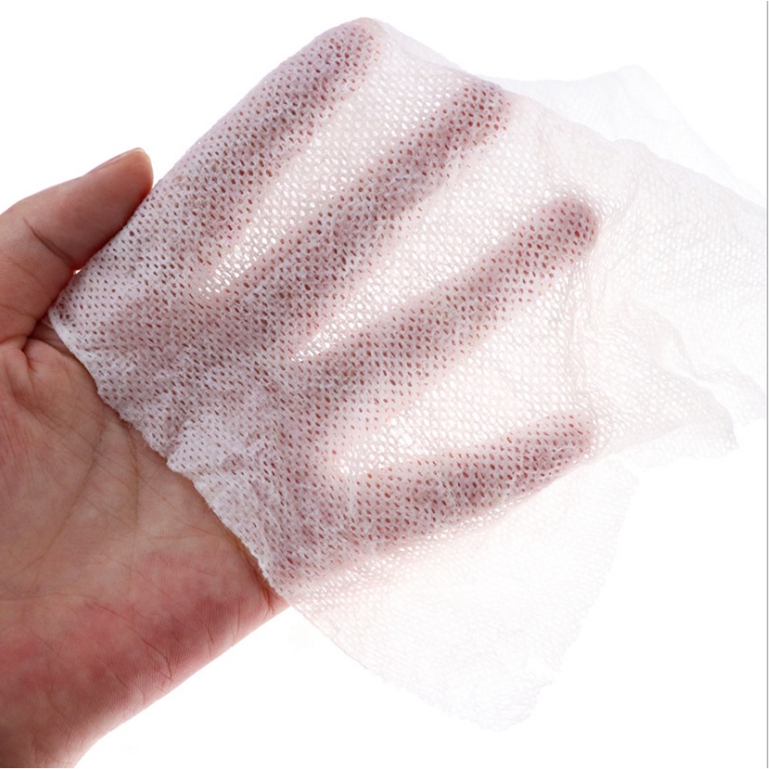 Khăn lau mặt nén cotton hình tròn không mùi dùng một lần, khăn khô nén viên kẹo đỏ Hàn Quốc Túi 20 viên Angola