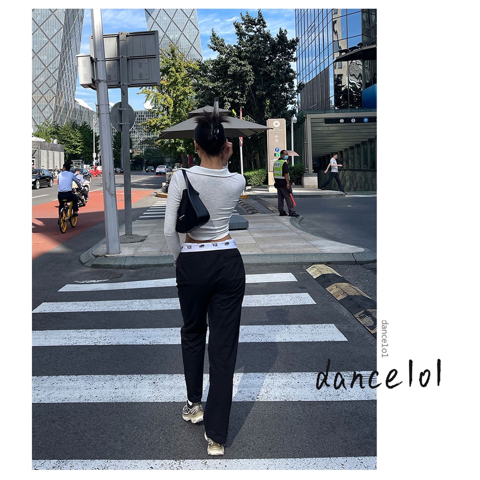 Quần dài lưng thấp in số và chữ phối màu phong cách cá tính thời trang cho nữ