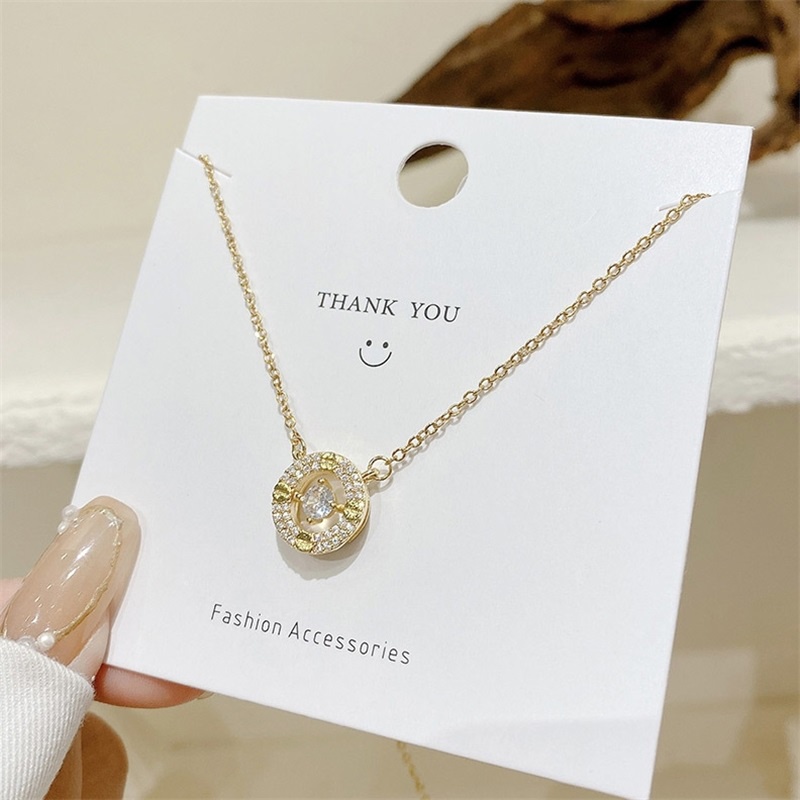 Dây chuyền thép titan mặt tròn đính đá Zircon