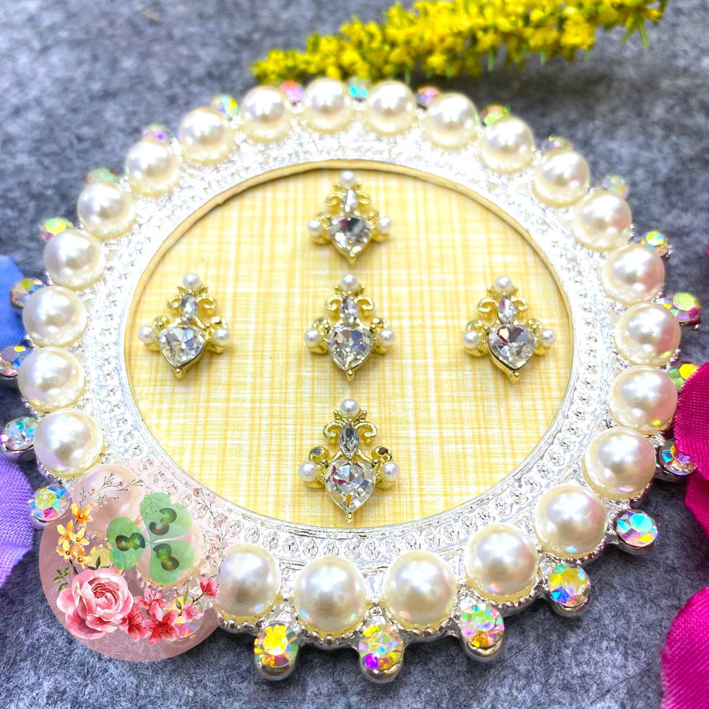 Mã CR040 . Charm kim loại đính đá trang trí móng siêu xinh.
