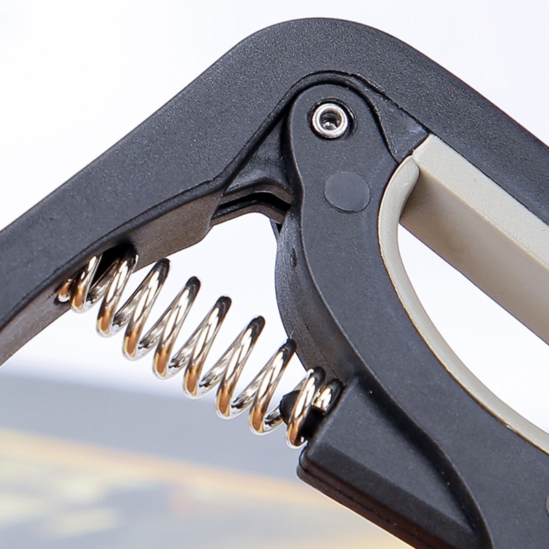 Capo 4 Dây Đàn Guitar 6 Dây Bằng Nhựa Nylon Và Silicone Tiện Dụng