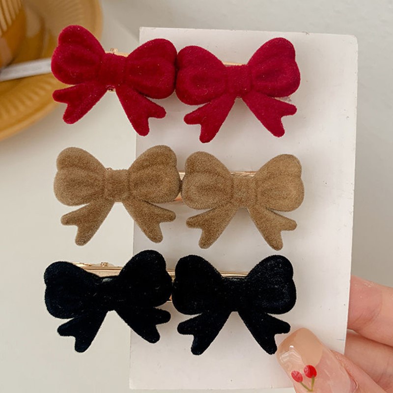 Kẹp tóc hình nơ xinh xắn cho nữ