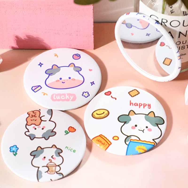 Gương Trang Điểm Cầm Tay Hình Bò Sữa Hoạt Hình Dễ Thương