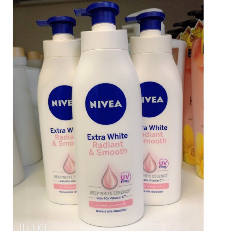 Sữa dưỡng thể Nivea Extra White & Smooth 400ml (Ban Ngày)