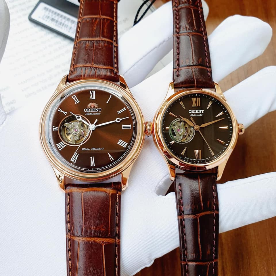 Đồng hồ cặp dôi nam nữ Orient AG00001T0 và RA-AG0023Y00C