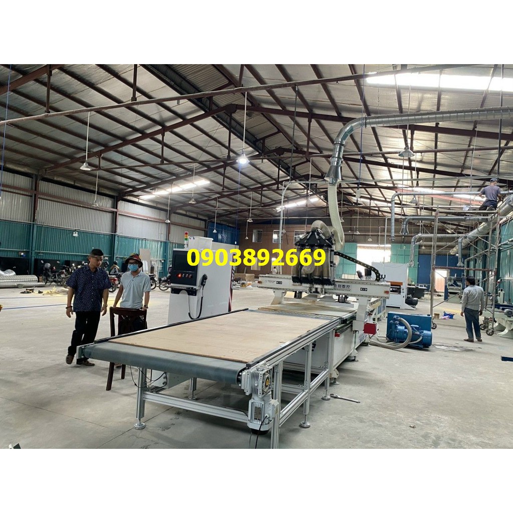 máy CNC 4 đầu có bàn lên phôi xuống ván