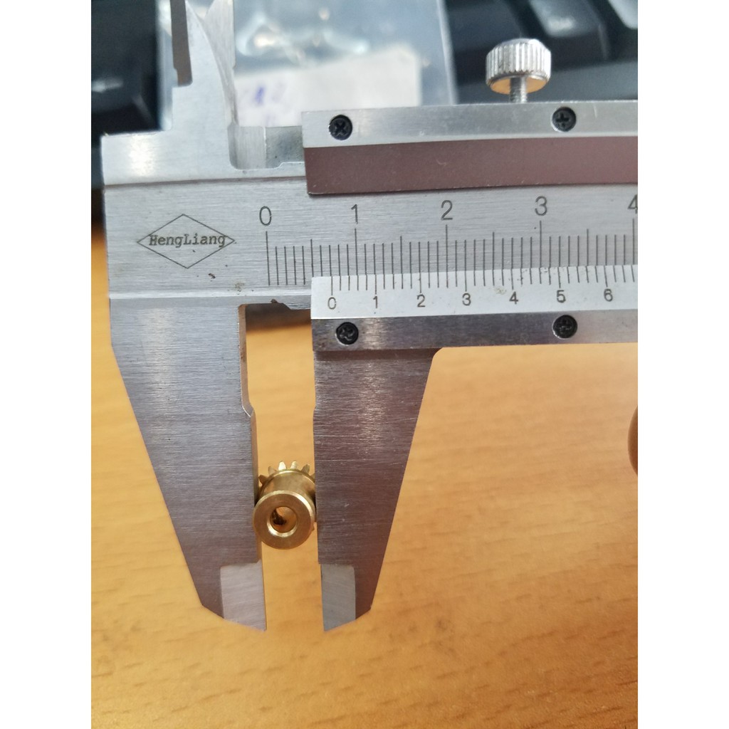 Phukienbanhrang Bánh răng côn siêu nhỏ 18 răng lỗ 3mm bằng đồng ,bộ truyền đảo chiều 90 độ