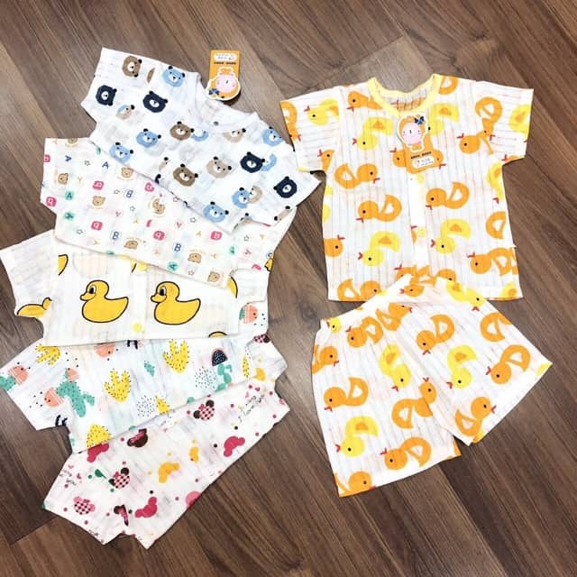 Bộ lửng tay cotton giấy cài cúc giữa mềm mai cho bé trai và gái