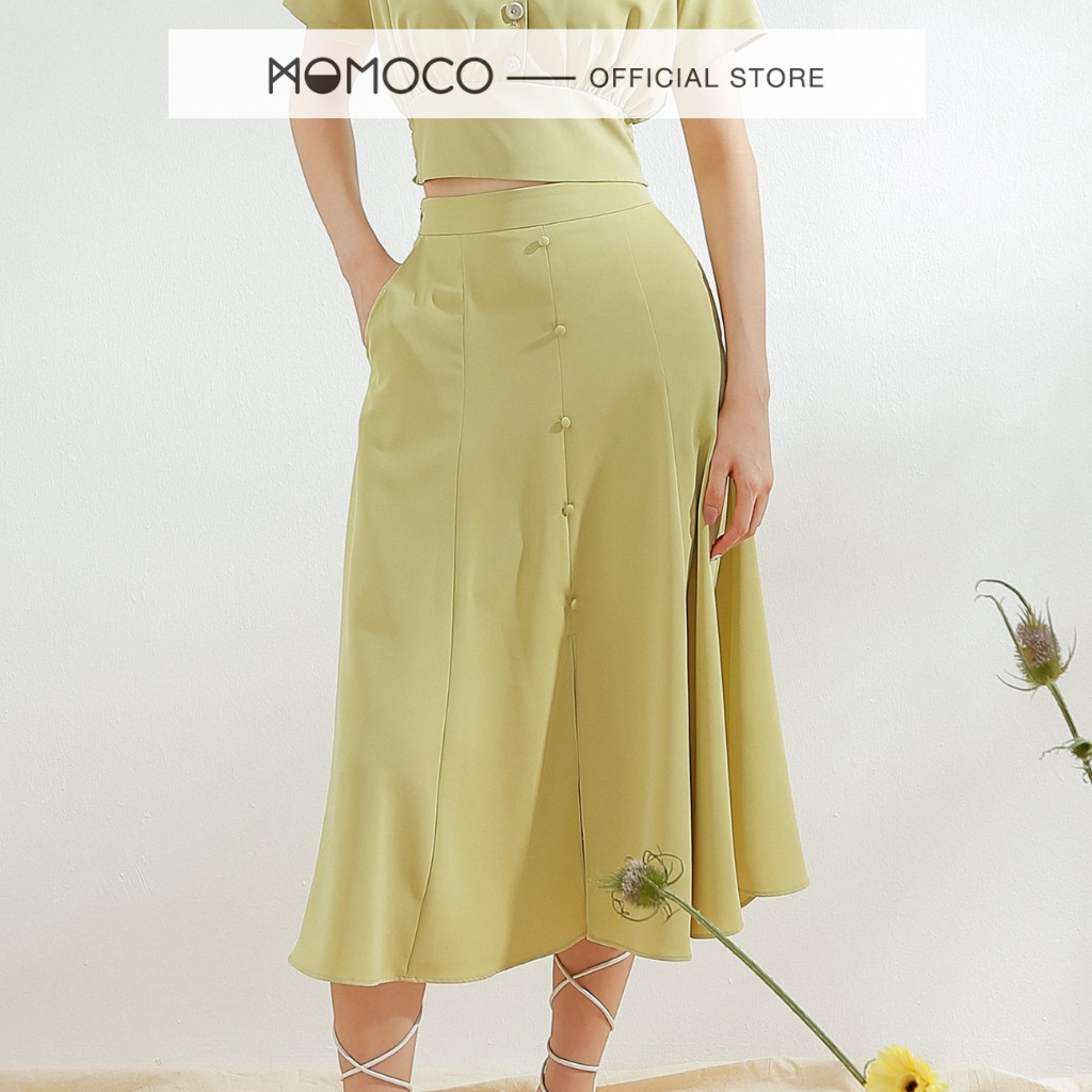 Chân Váy Xòe Midi MOMOCO Khuy Bọc Xẻ Tà Thân Trước Chất Trượt Mêm Không Nhăn M2837