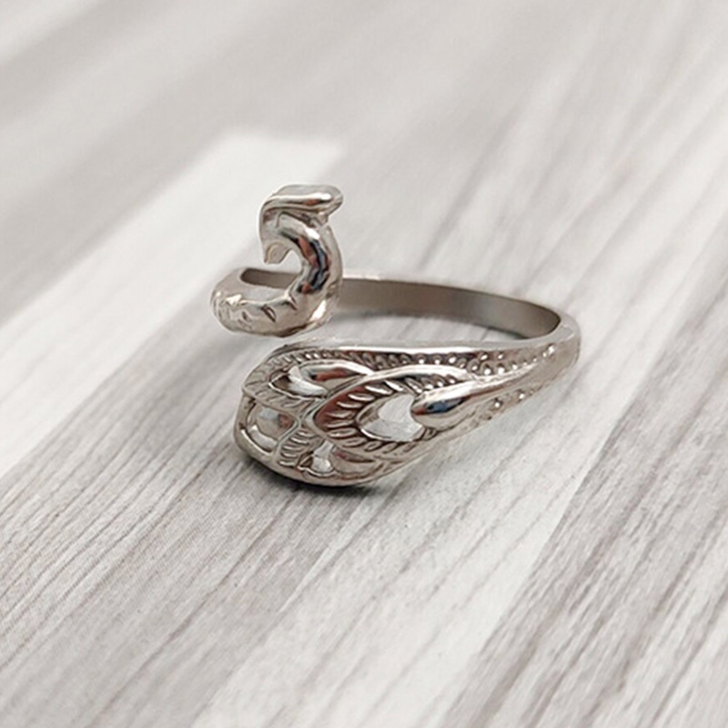 Nhẫn đeo tay kim loại hình chim công