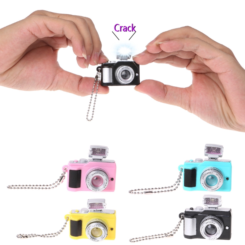 Móc chìa khóa hình máy ảnh có đèn led kèm nhạc vui nhộn