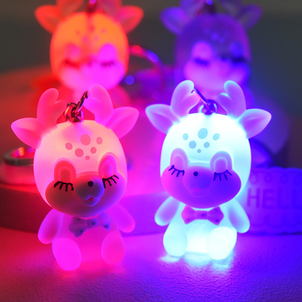 Móc gắn chìa khóa hình con nai có đèn led sáng tạo