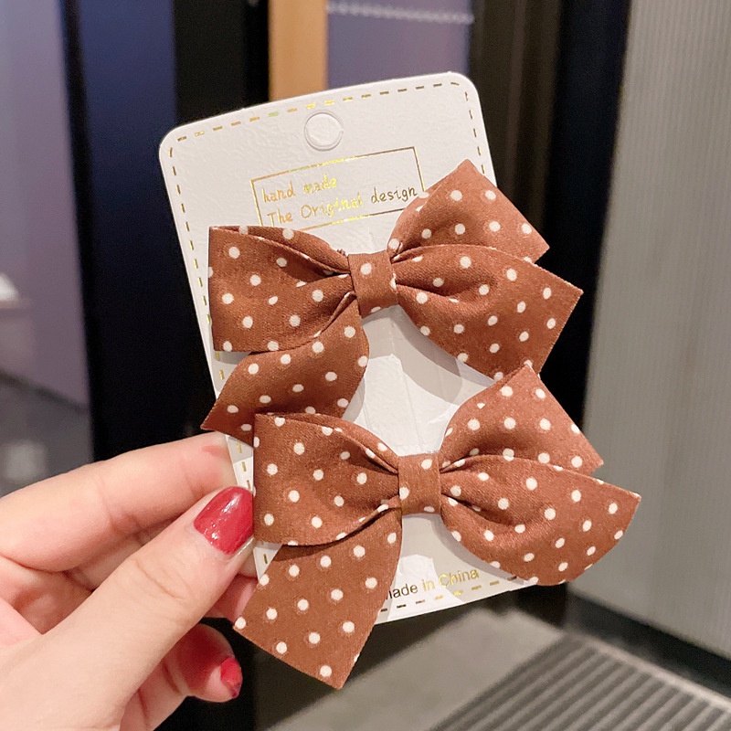 Cặp kẹp tóc thiết kế nơ họa tiết chấm bi phong cách Hàn Quốc xinh xắn dành cho nữ