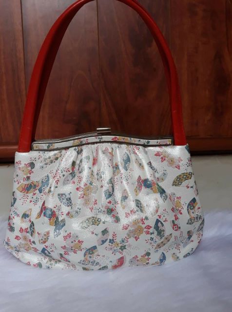 Túi xách tay da thật