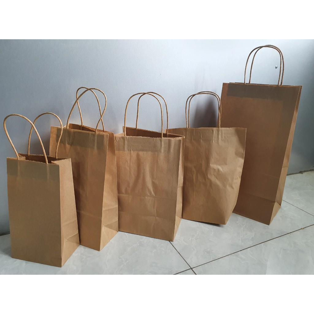 XẢ KHO - Túi giấy kraft, túi giấy xi măng có quai xách chỉ từ 1680đ/túi