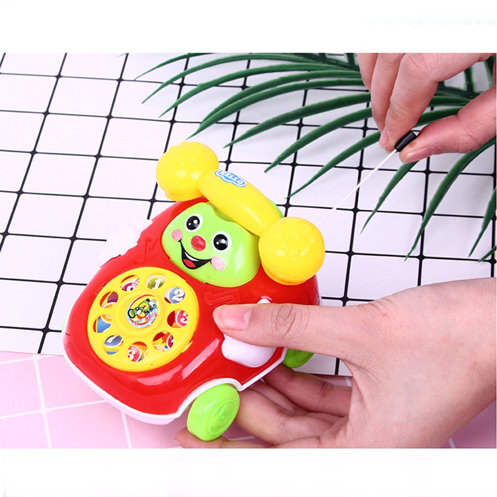 Điện thoại ô tô đồ chơi, xe ô tô đồ chơi cho bé kéo dây cót
