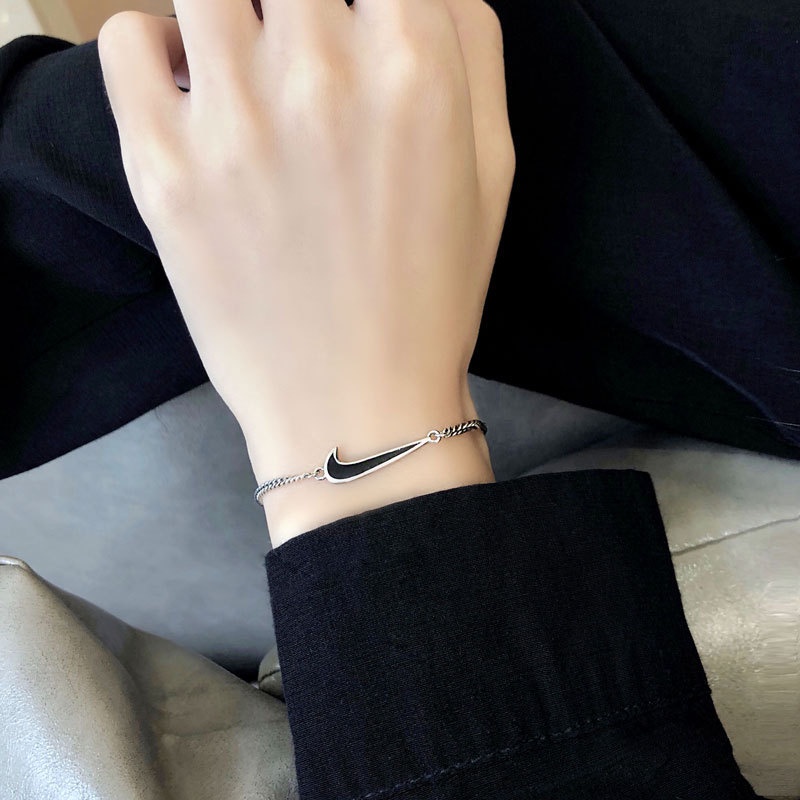 Vòng tay dây da mặt hình Nike thời trang cho nam nữ