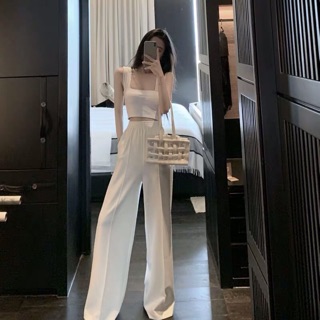 (Hàng Quảng Châu) Set trang phục áo thun croptop trắng 2 dây bản + quần dài trắng ống suông (TB)