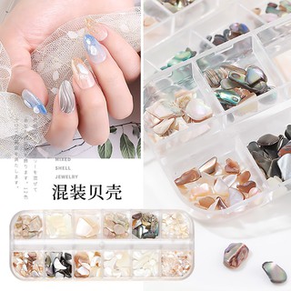 Phụ kiện trang trí móng hình viên sỏi