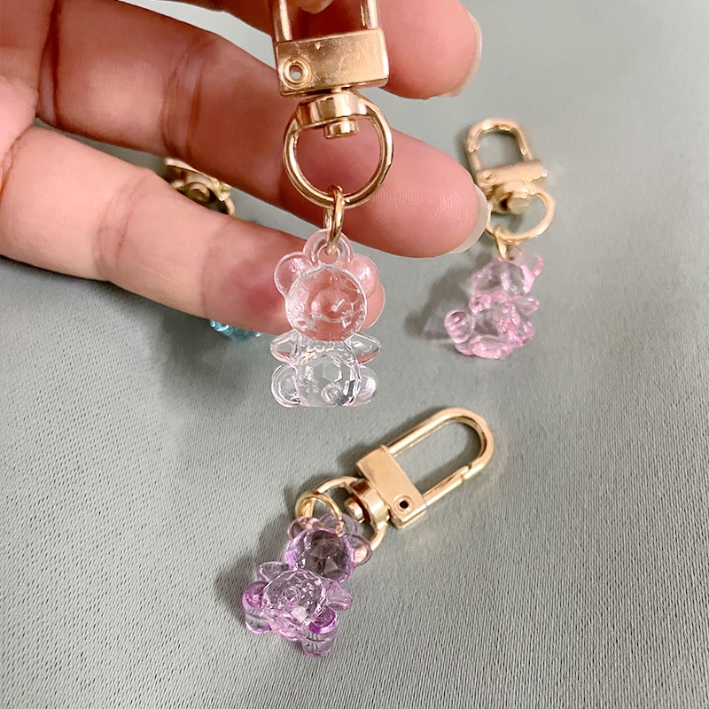 Móc Khóa Gắn Vỏ Bảo Vệ Hộp Sạc Tai Nghe Airpods Trong Suốt Hình Gấu Dễ Thương