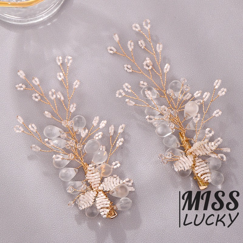 Set hoa tai và kẹp tóc pha lê sáng bóng cho cô dâu