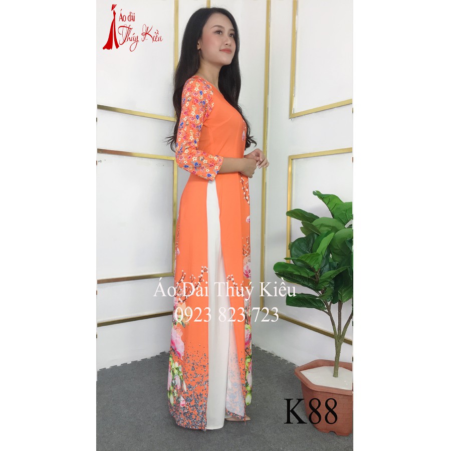 Áo dài nữ may sẵn thiết kế đẹp nền cam hoa đào cách tân tết K88 Thúy Kiều mềm mại, co giãn, áo dài giá rẻ