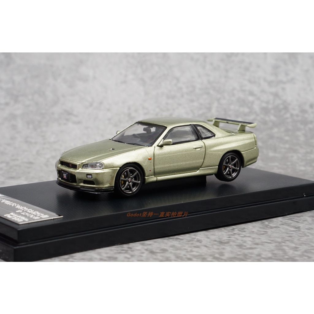 Đồ trang trí Xe Hơi Nissan GTR R34 Hợp Kim Tỉ Lệ 1:64