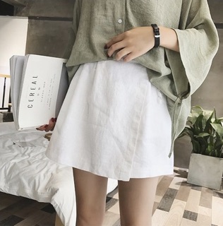 Chân váy buộc nơ vạt lệch