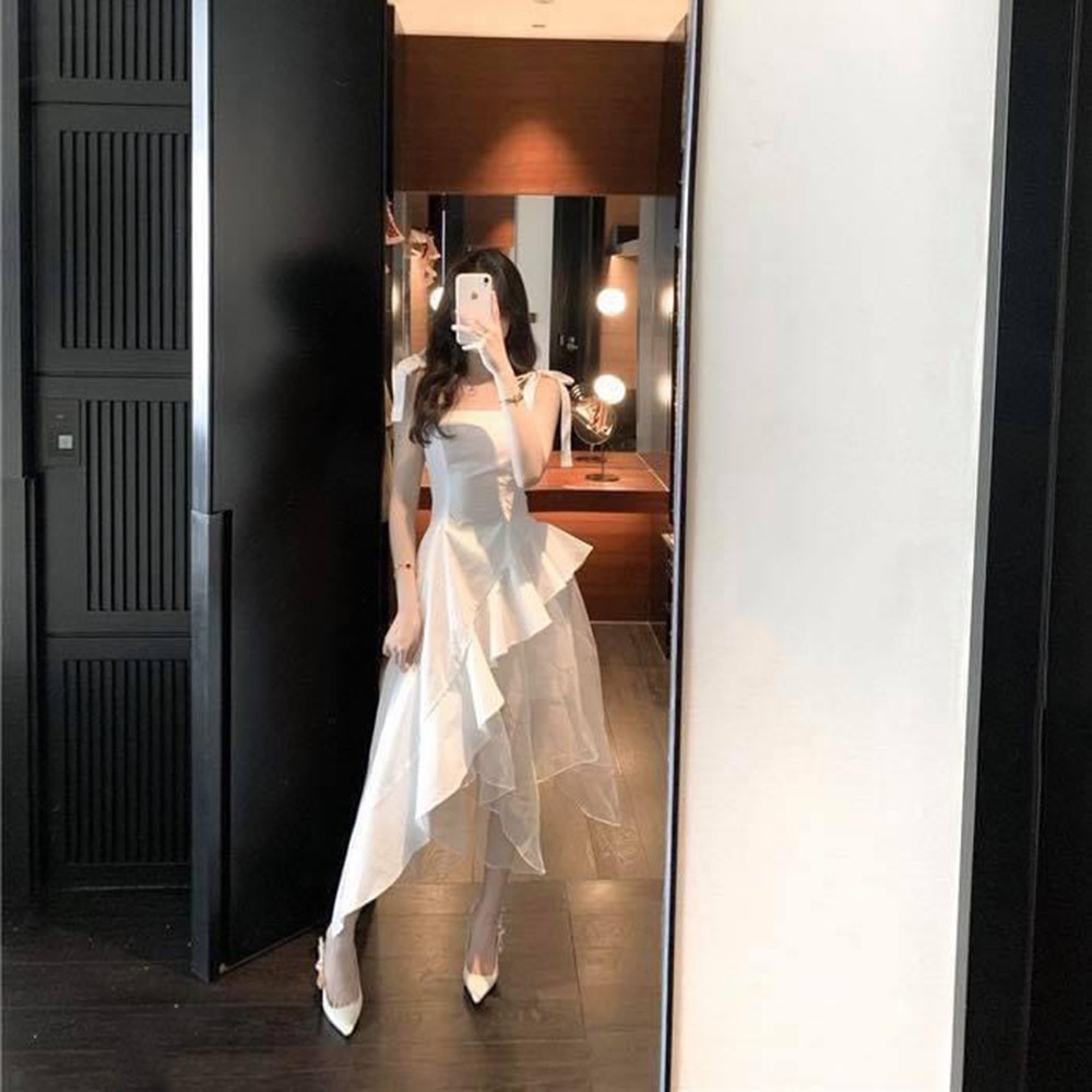 Đầm váy nữ màu trắng dáng xòe cột nơ vai lệch tà phong cách thời trang Hà Kiều thiết kế đẹp | BigBuy360 - bigbuy360.vn