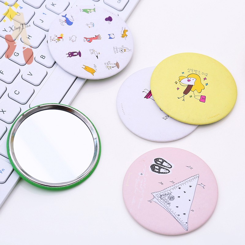 Gương trang điểm mini cầm tay TinTin, bỏ túi cất gọn hình tròn có nhiều họa tiết đáng yêu dành cho các bạn gái