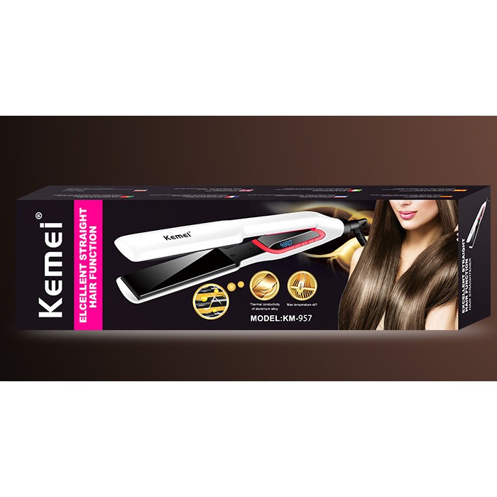Máy duỗi tóc mini - Kemei KM-957,Phần tỏa nhiệt được sơn tĩnh điện không bong tróc.Thích hợp với mọi loại tóc