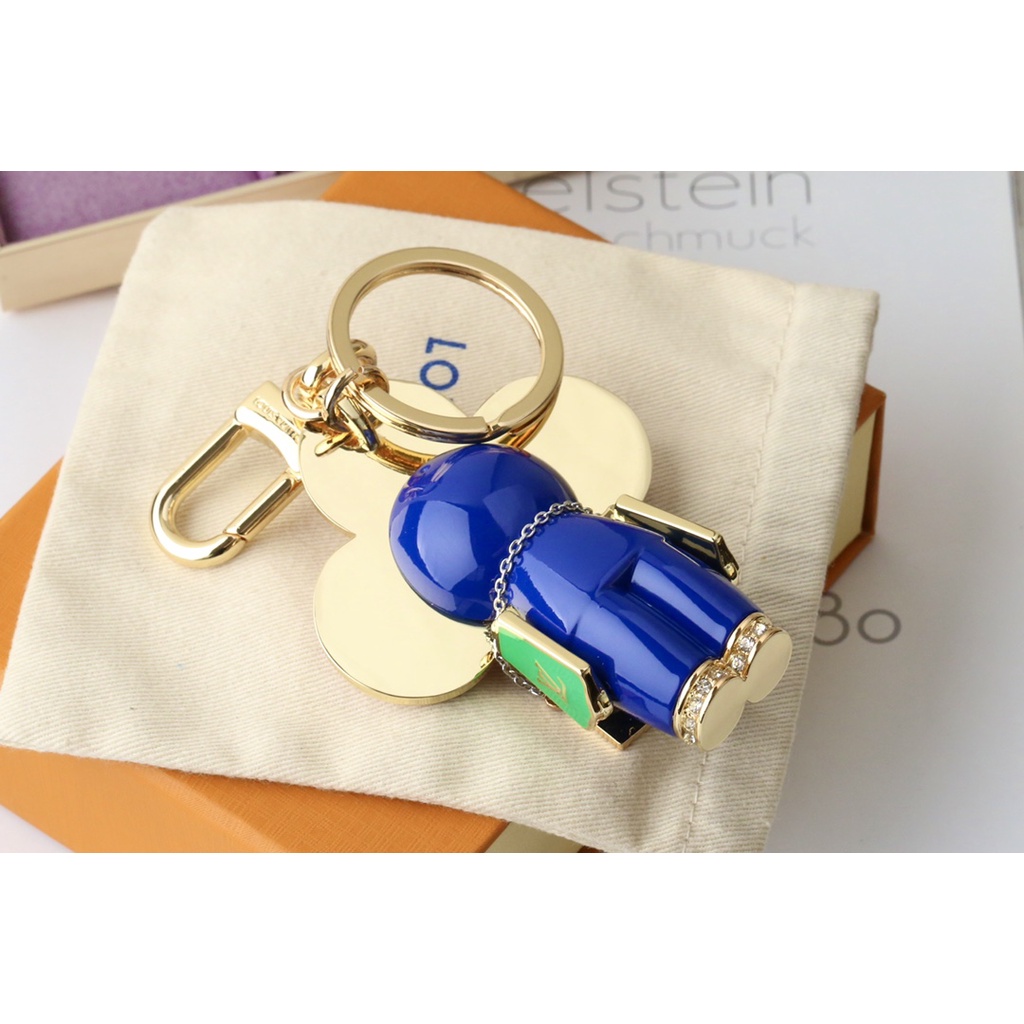 Móc Khóa Hình Hoa Hướng Dương LV Màu Vàng Tương Phản