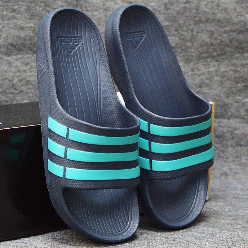 Adidas Duramo màu xanh đen sọc xanh ngọc