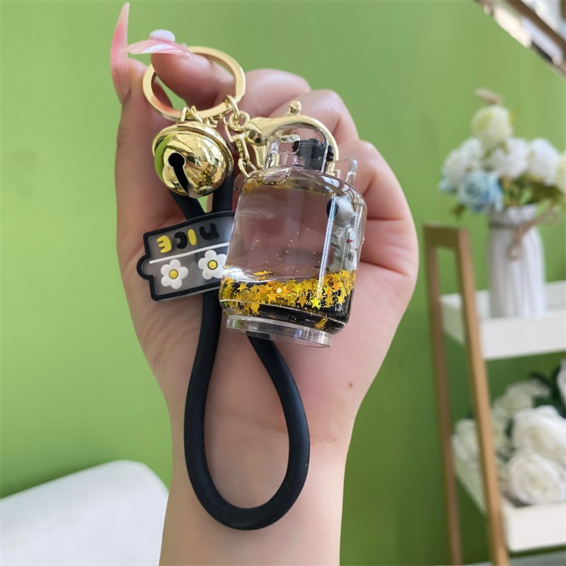 Móc Khóa Xe Hơi Hình Phi Hành Gia Bằng Acrylic Màu Vàng Đen Sáng Tạo