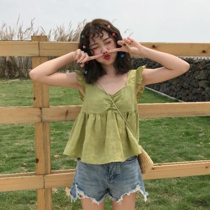 Áo hai dây IELGY dáng rộng màu xanh lá / mơ hở lưng phong cách Hàn Quốc cho nữ