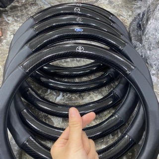 Xả kho bọc vô lăng carbon có logo các hãng xe - Ví giá rẻ